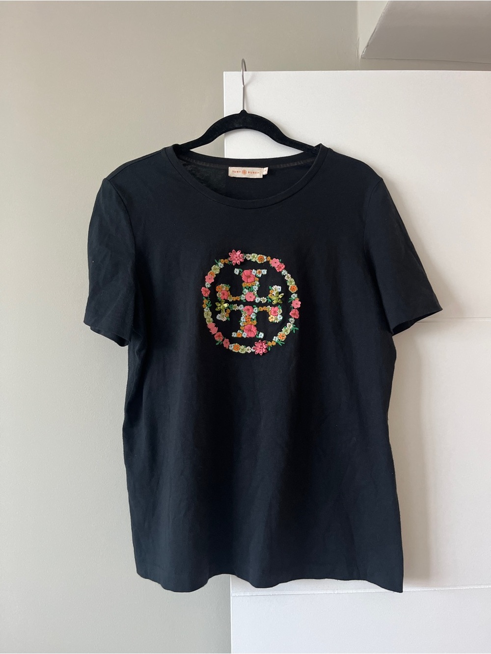 Tory Burch Black Tee with 3-D sequined floral embroidery logo size Large